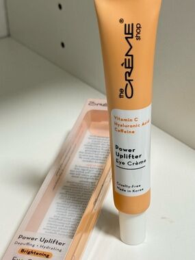 the CRÈME Shop Power Uplifter Eye Crème - Peach/Orange